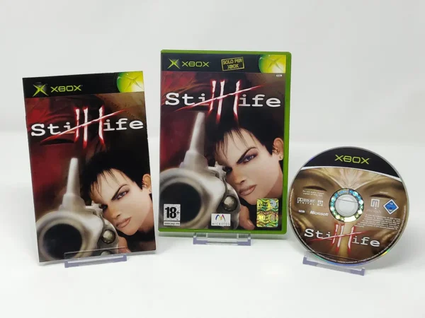 Interior del juego Still Life (ITA) para XBOX con disco y manual