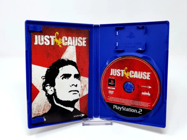 Interior del juego Just Cause (UK) para PlayStation 2 con disco y manual