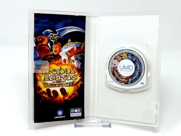 Interior del juego Untold Legends: The Warrior's Code (ESP) para PSP con disco y manual