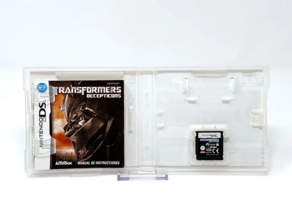 Interior del juego Transformers: Decepticons (ESP) para Nintendo DS con disco y manual
