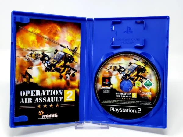 Interior del juego Operation Air Assault 2 (ESP) para PlayStation 2 con disco y manual