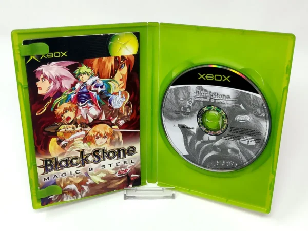Interior del juego Black Stone: Magic & Steel (ESP) para XBOX con disco y manual