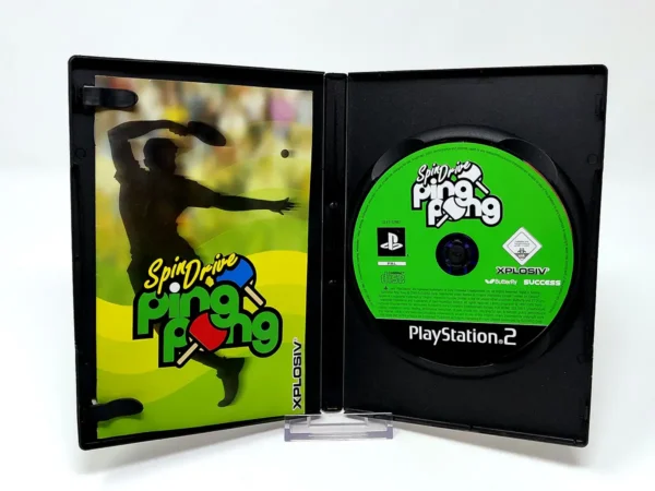 Interior del juego SpinDrive Ping Pong (ESP) para PlayStation 2 con disco y manual