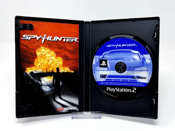 Interior del juego SpyHunter (FRA) para PlayStation 2 con disco y manual