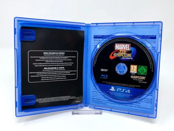 Interior del juego Marvel vs. Capcom: Infinite (ESP) para PlayStation 4 con disco y manual