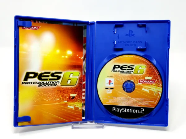 Interior del juego PES 6: Pro Evolution Soccer (FRA) para PlayStation 2 con disco y manual