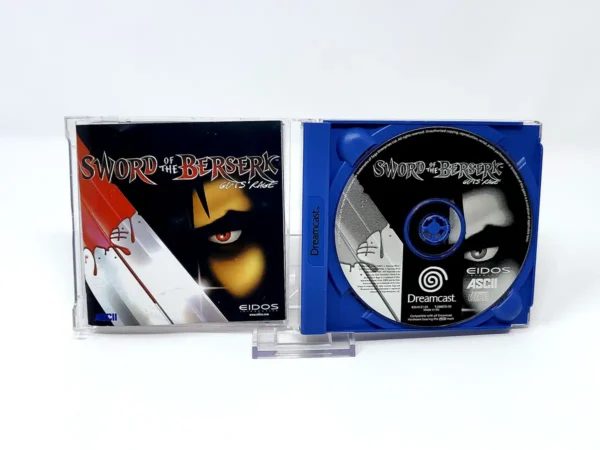 Interior del juego Sword of the Berserk: Guts' Rage (EUR) para Sega Dreamcast con disco y manual