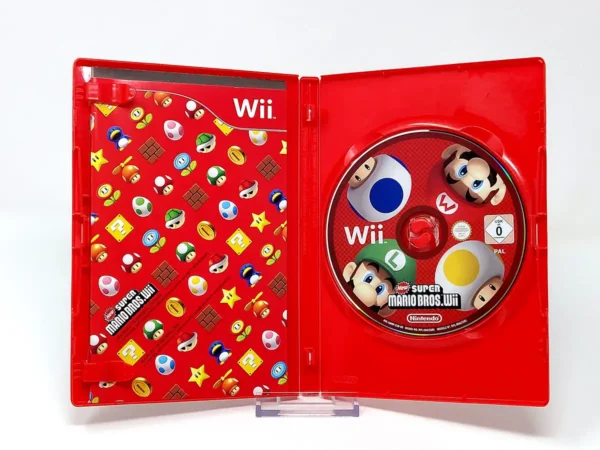 Interior del juego New Super Mario Bros. Wii (ESP) para Nintendo Wii con disco y manual