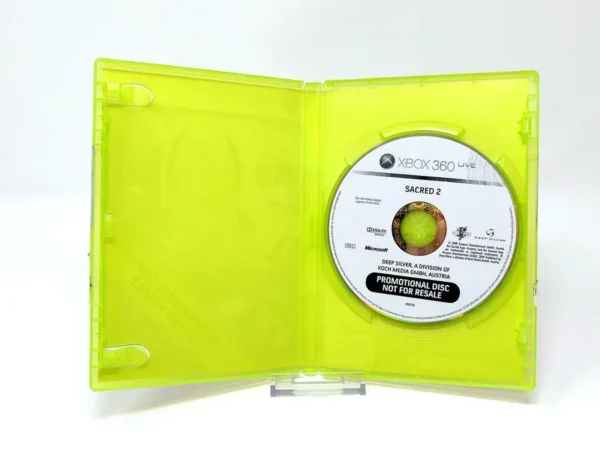 Interior del juego Sacred 2 - Fallen Angel (UK) (Promo) para XBOX 360 con disco y manual