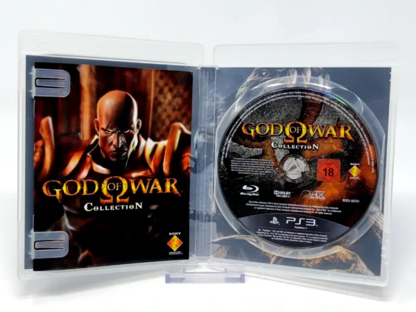 Interior del juego God of War Collection (ESP) para PlayStation 3 con disco y manual