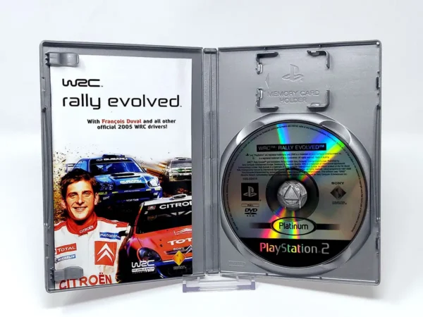 Interior del juego WRC: Rally Evolved (FRA) (Platinum) para PlayStation 2 con disco y manual