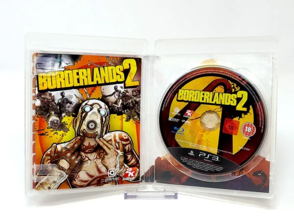 Interior del juego Borderlands 2 (FRA) (v1) para PlayStation 3 con disco y manual