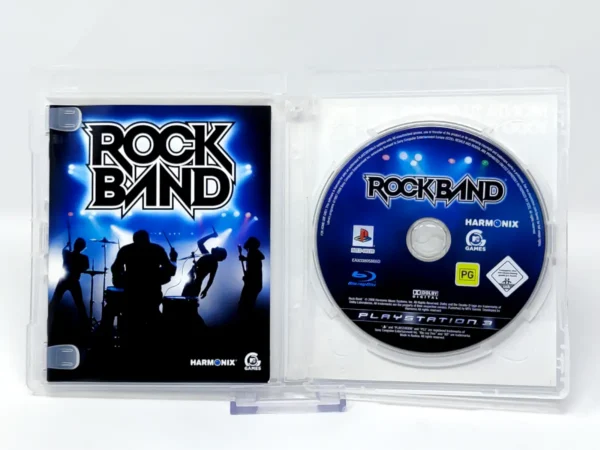 Interior del juego Rock Band (ESP) para PlayStation 3 con disco y manual