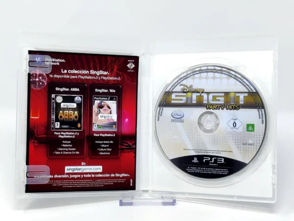 Interior del juego Disney Sing It: Party Hits (ESP) (Rebajado) para PlayStation 3 con disco y manual