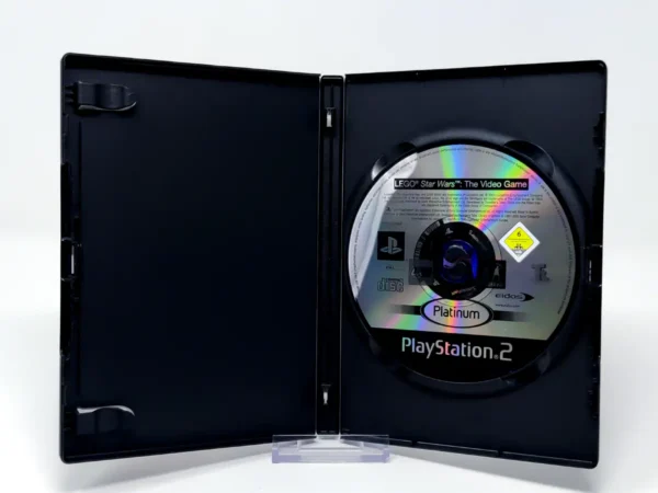 Interior del juego LEGO Star Wars: El Videojuego (ESP) (Platinum) (Rebajado) para PlayStation 2 con disco y manual