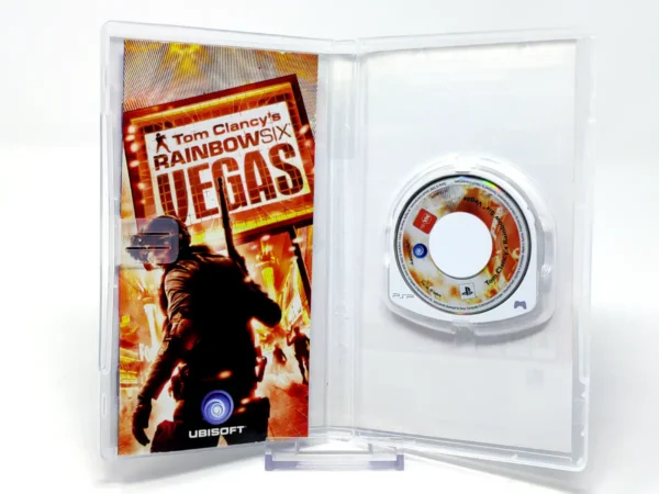 Interior del juego Tom Clancy's Rainbow Six: Vegas (ESP) para PSP con disco y manual