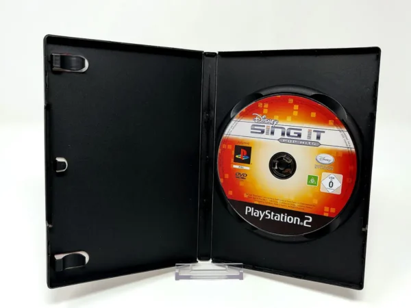 Interior del juego Disney Sing It: Pop Hits (ESP) (Rebajado) para PlayStation 2 con disco y manual