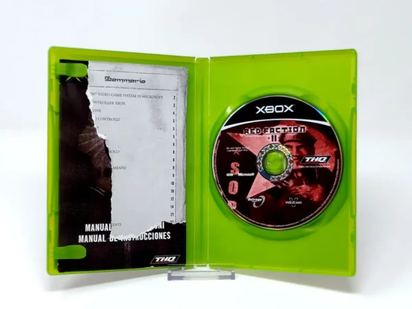 Interior del juego Red Faction II (ESP) para XBOX con disco y manual