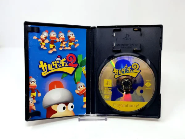 Interior del juego Saru! Get You! 2 (JAP) para PlayStation 2 con disco y manual