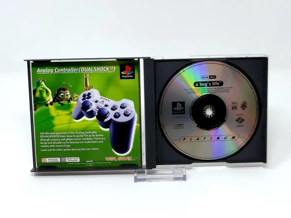 Interior del juego Disney/Pixar: A Bug's Life (UK) (Platinum) (Rebajado) para PlayStation 1 con disco y manual