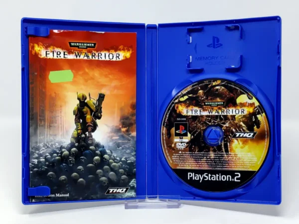 Interior del juego Warhammer 40,000: Fire Warrior (ESP) para PlayStation 2 con disco y manual