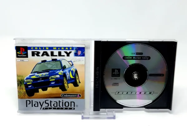 Interior del juego Colin McRae Rally (UK) (Platinum) para PlayStation 1 con disco y manual
