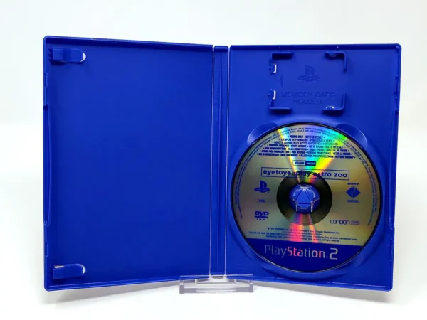 Interior del juego EyeToy Play: Astro Zoo (ESP) (Promo) para PlayStation 2 con disco y manual