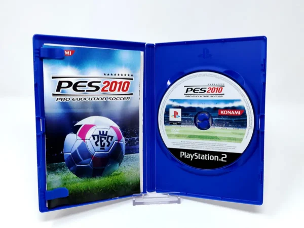 Interior del juego PES 2010: Pro Evolution Soccer (ITA) para PlayStation 2 con disco y manual