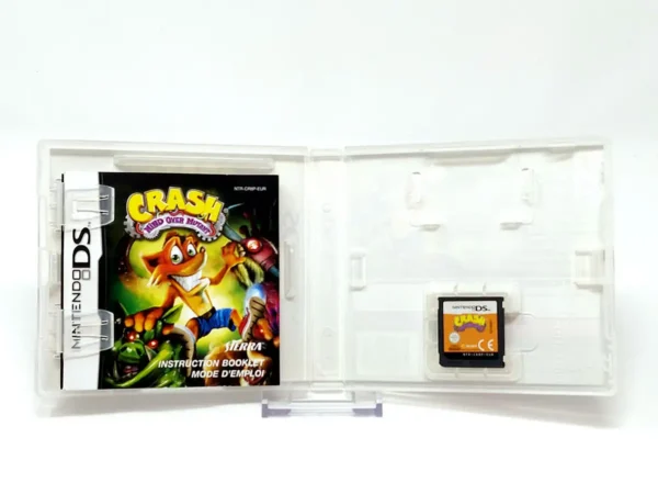 Interior del juego Crash: Mind over Mutant (ESP) para Nintendo DS con disco y manual