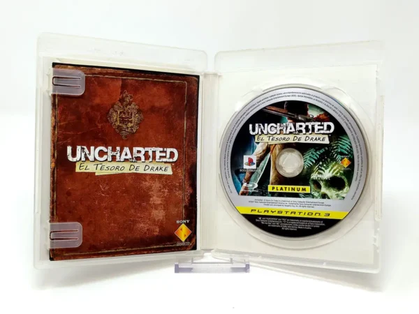 Interior del juego Uncharted: El Tesoro de Drake (ESP) (Platinum) para PlayStation 3 con disco y manual