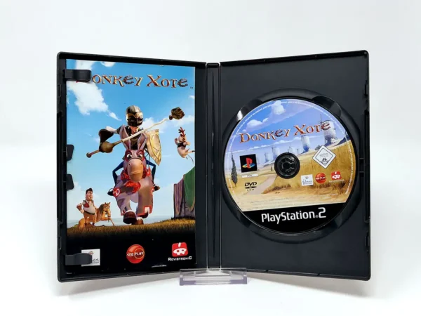 Interior del juego Donkey Xote (ESP) para PlayStation 2 con disco y manual