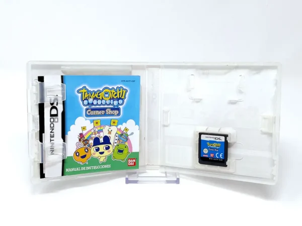 Interior del juego Tamagotchi Connexion: Corner Shop (ESP) para Nintendo DS con disco y manual