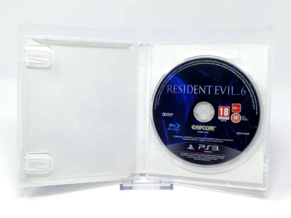 Interior del juego Resident Evil 6 (UK) (Rebajado) para PlayStation 3 con disco y manual