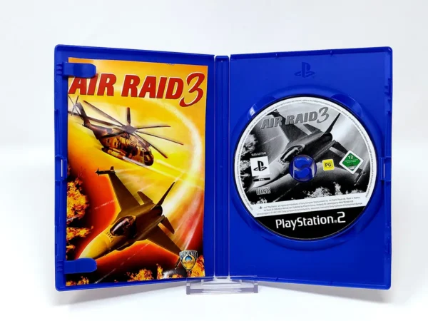 Interior del juego Air Raid 3 (EUR) para PlayStation 2 con disco y manual