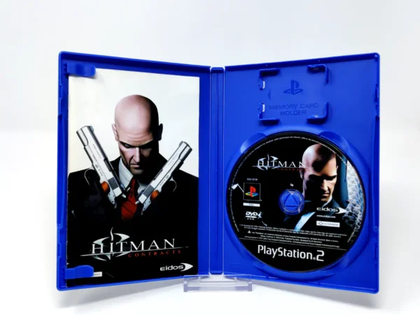 Interior del juego Hitman: Contracts (ESP) para PlayStation 2 con disco y manual