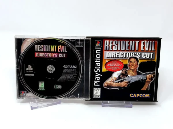 Interior del juego Resident Evil: Director's Cut (USA) para PlayStation 1 con disco y manual