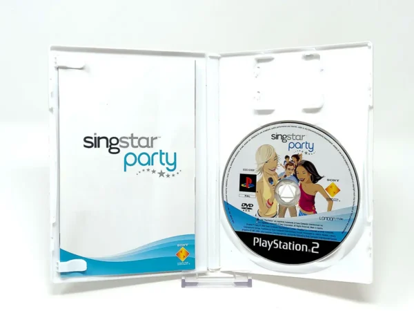 Interior del juego SingStar Party (ESP) para PlayStation 2 con disco y manual