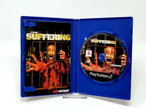 Interior del juego The Suffering (ESP) para PlayStation 2 con disco y manual