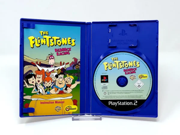 Interior del juego The Flintstones: Bedrock Racing (UK) para PlayStation 2 con disco y manual