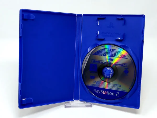 Interior del juego Shadow of the Colossus (ESP) (Promo) para PlayStation 2 con disco y manual