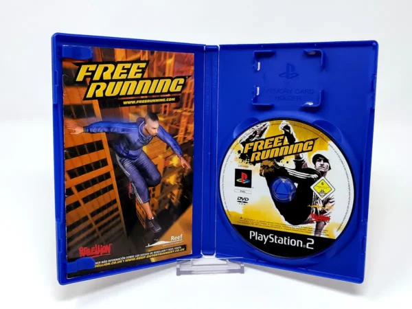 Interior del juego Free Running (ESP) para PlayStation 2 con disco y manual