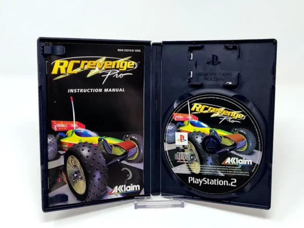 Interior del juego RC Revenge Pro (UK) para PlayStation 2 con disco y manual