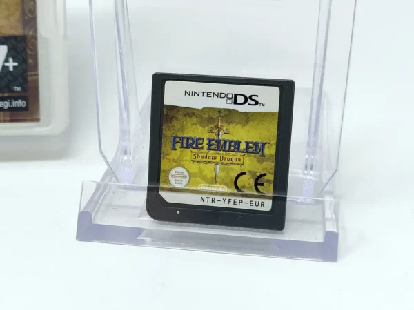 Interior del juego Fire Emblem: Shadow Dragon (ESP) para Nintendo DS con disco y manual