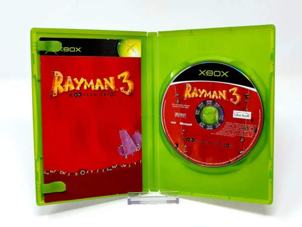 Interior del juego Rayman 3: Hoodlum Havoc (ESP) para XBOX con disco y manual