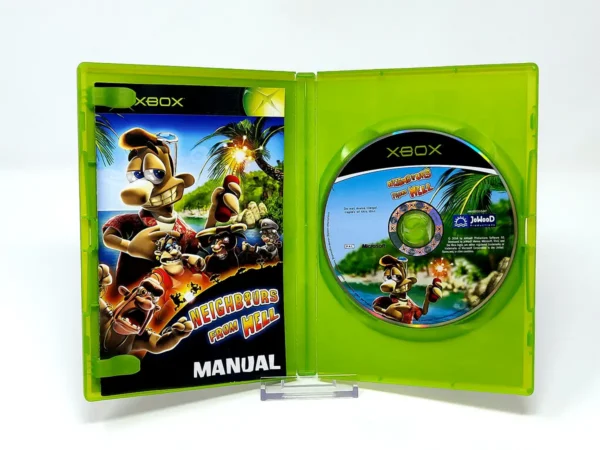 Interior del juego Neighbours from Hell (ESP) para XBOX con disco y manual