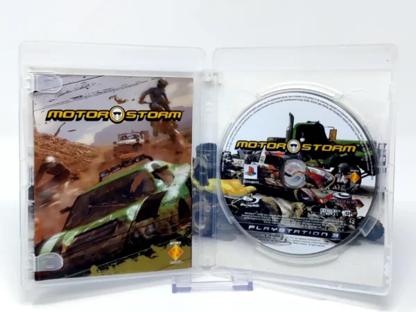 Interior del juego MotorStorm (ESP) para PlayStation 3 con disco y manual