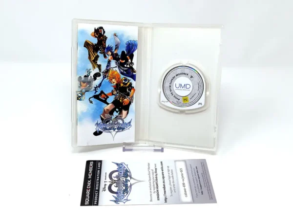 Interior del juego Kingdom Hearts: Birth by Sleep (ESP) para PSP con disco y manual