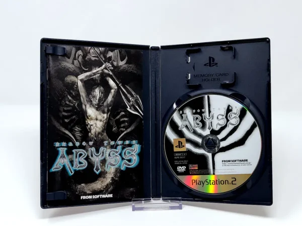 Interior del juego Shadow Tower Abyss (JAP) para PlayStation 2 con disco y manual