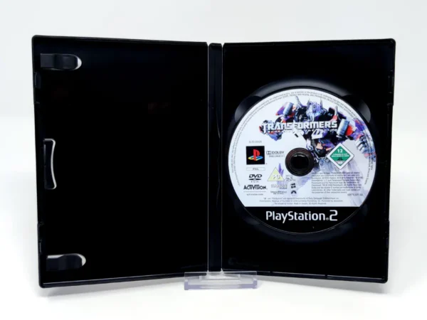 Interior del juego Transformers: La Venganza de los Caídos (ESP) (Muy Rebajado) para PlayStation 2 con disco y manual