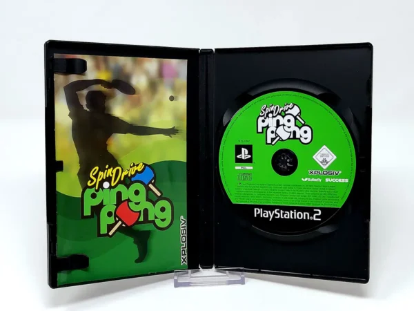 Interior del juego SpinDrive Ping Pong (FRA) para PlayStation 2 con disco y manual